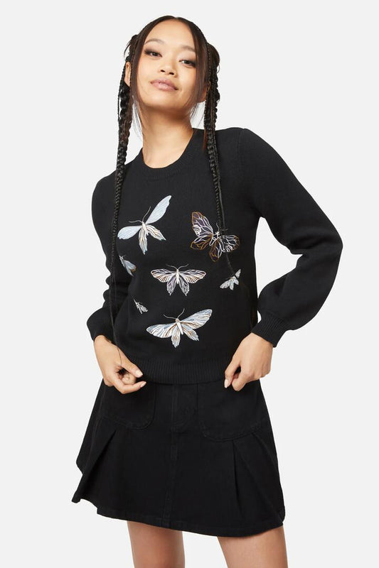 Image of a model wearing Tops. Productname: Larve Knit in Black colour by brand - Black Friday