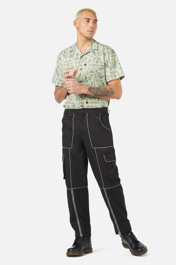 Image of a model wearing Pants. Productname: Pipeline Unisex Pant in Black colour by brand - Black Friday