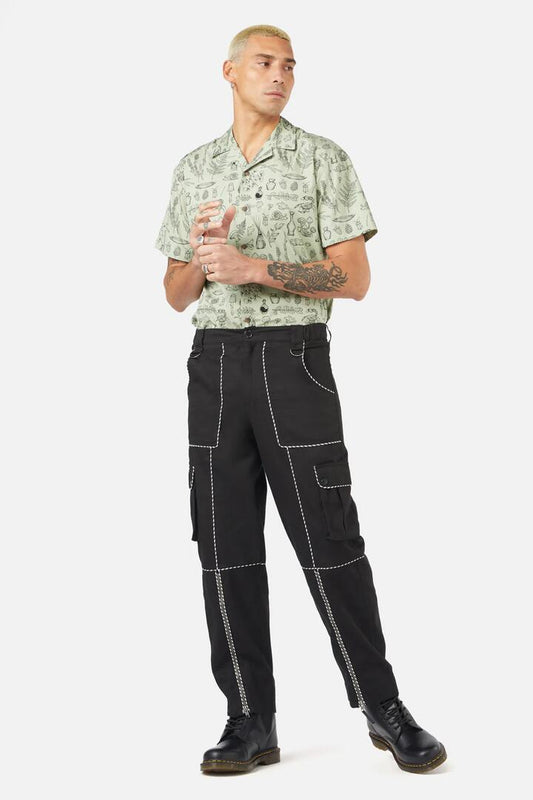 Image of a model wearing Pants. Productname: Pipeline Unisex Pant in Black colour by brand - Black Friday