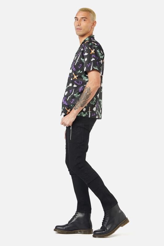 Image of a model wearing Tops. Productname: Slayer SS Shirt in Black colour by brand - Dangerfield