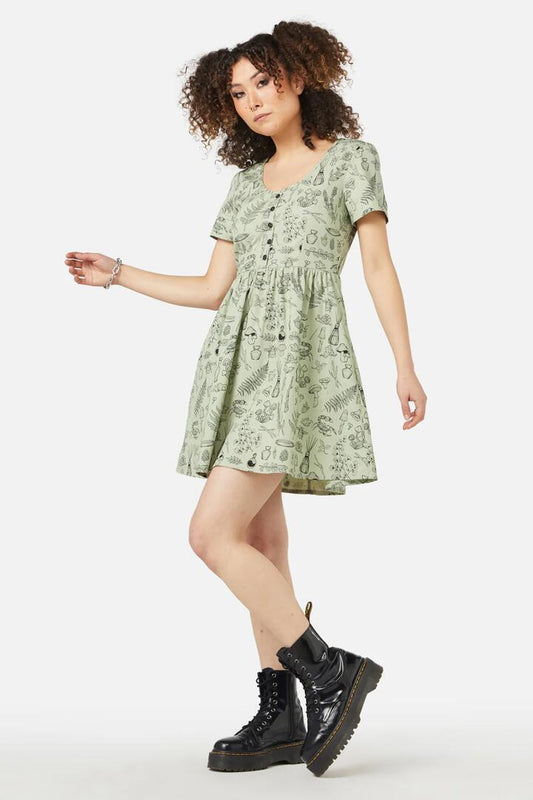Image of a model wearing Dress. Productname: Sprouted Flora Dress in Sage colour by brand - Black Friday