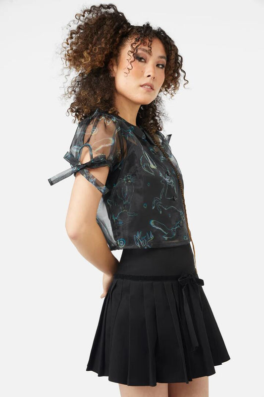 Image of a model wearing Tops. Productname: Aura Blouse in Black colour by brand - Black Friday