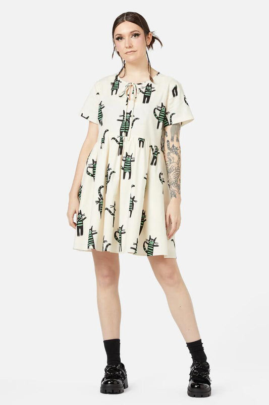 Image of a model wearing Dress. Productname: Peculiar Puss Summer Dress in Cream colour by brand - Dangerfield