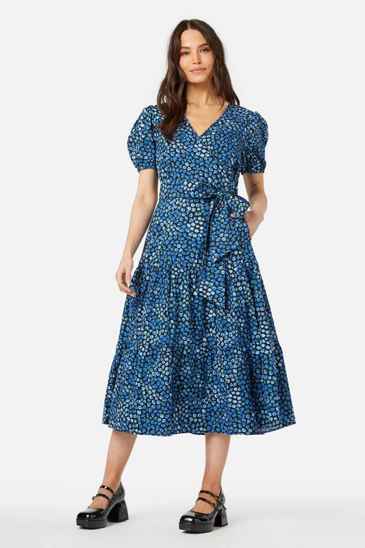 Image of a model wearing Dress. Productname: Bessie Midi Wrap Dress in Blue colour by brand - Princess Highway