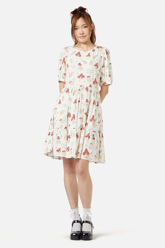 Image of a model wearing Dress. Productname: Harmony Printed Dress in Cream colour by brand - Dangerfield