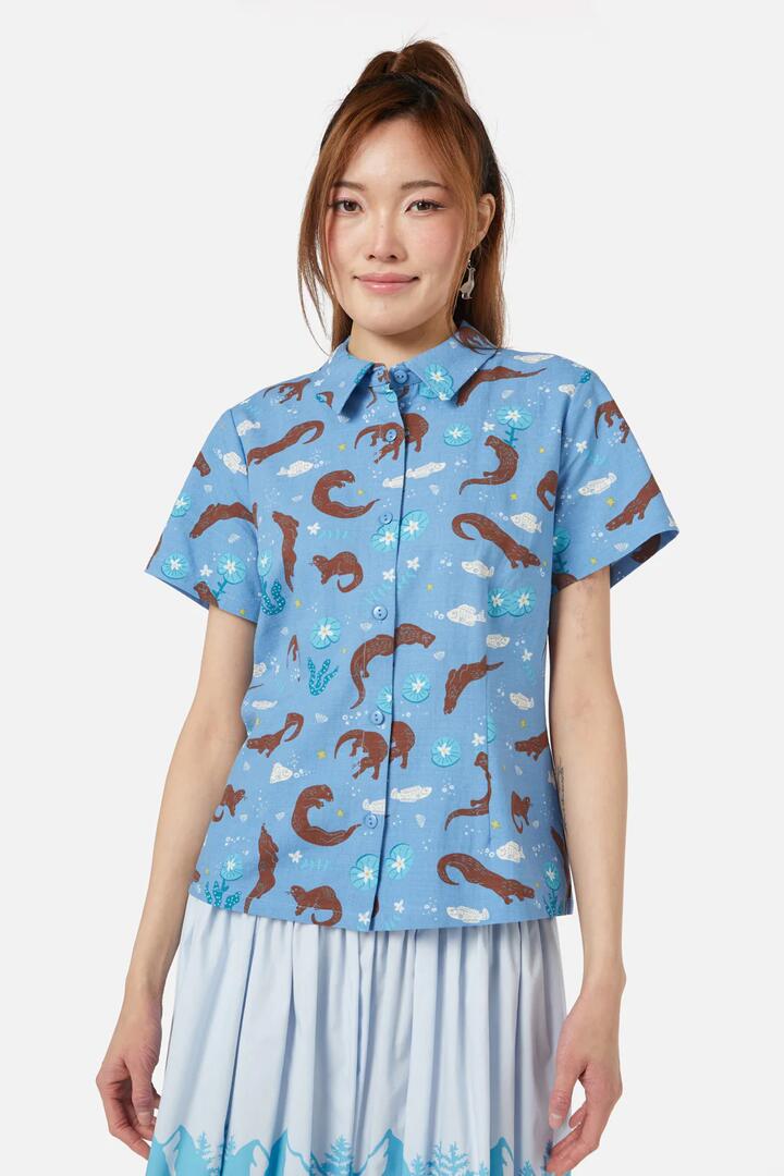 Image of a model wearing Tops. Productname: Otterly Adorable Blouse in Blue colour by brand - Dangerfield