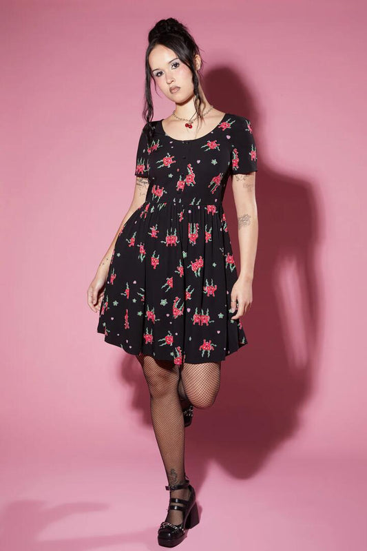 Image of a model wearing Dress. Productname: Cheeky Cherries Printed Dress in Black colour by brand - Black Friday