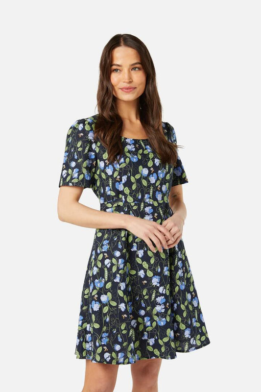 Image of a model wearing Dress. Productname: Sweet Pea Mini Dress in Navy colour by brand - Princess Highway