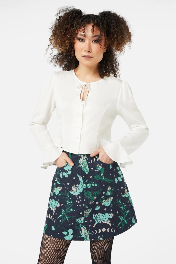 Image of a model wearing Tops. Productname: Witches Room Blouse in Cream colour by brand - Black Friday