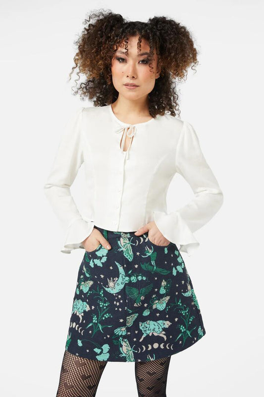 Image of a model wearing Tops. Productname: Witches Room Blouse in Cream colour by brand - Black Friday