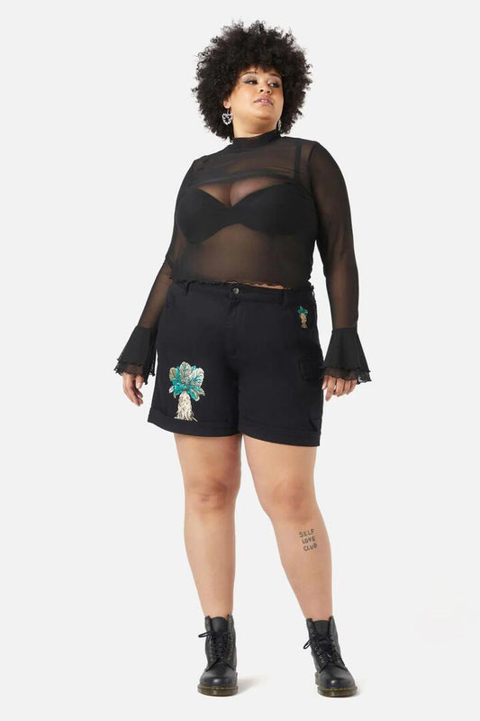 Image of a model wearing Tops. Productname: Curve Aura Top in Black colour by brand - Black Friday