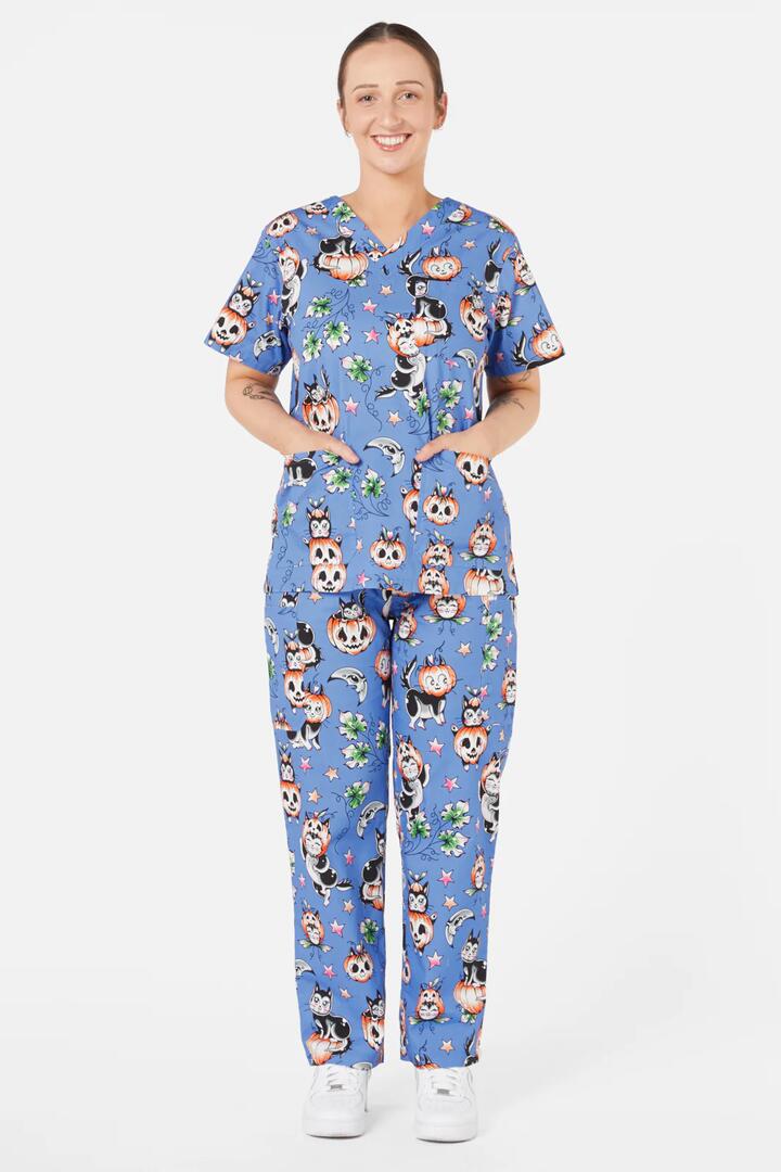 Image of a model wearing Uniforms & Workwear. Productname: Pumpkin Kitty Scrub Set in Blue colour by brand - Scrubs With Love