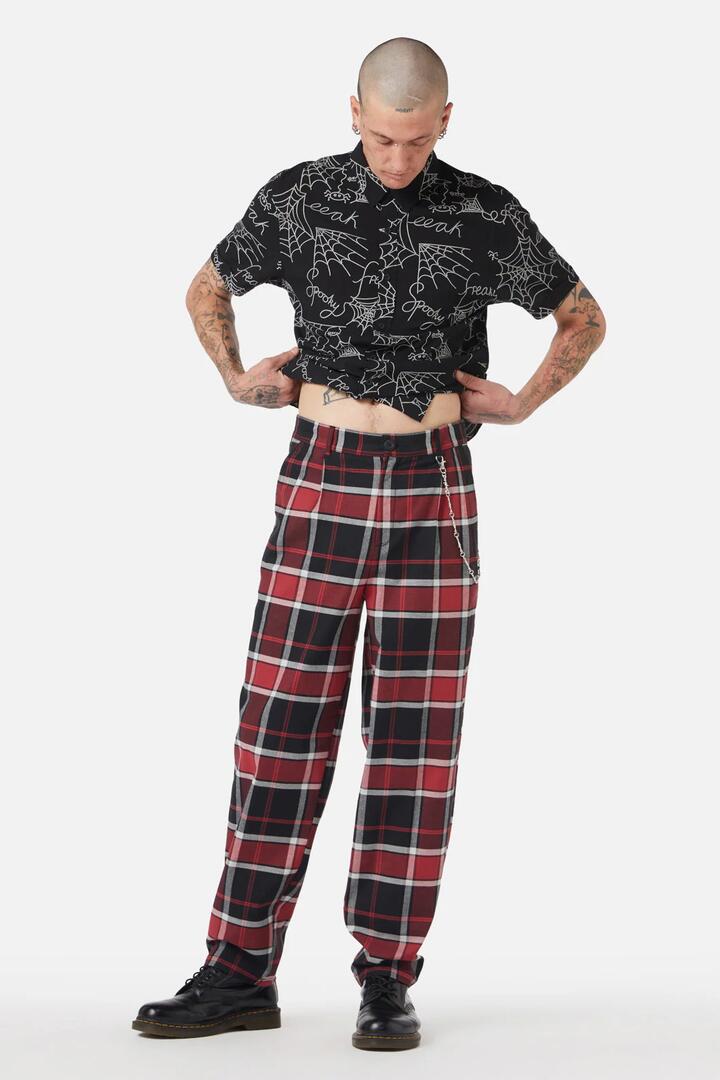 Image of a model wearing Pants. Productname: Ursula Tartan Pant in Black/Red colour by brand - Black Friday