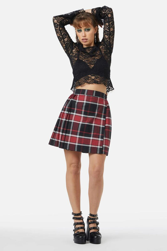 Image of a model wearing Skirts. Productname: Ursula Pleated Skirt in Black/Red colour by brand - Black Friday