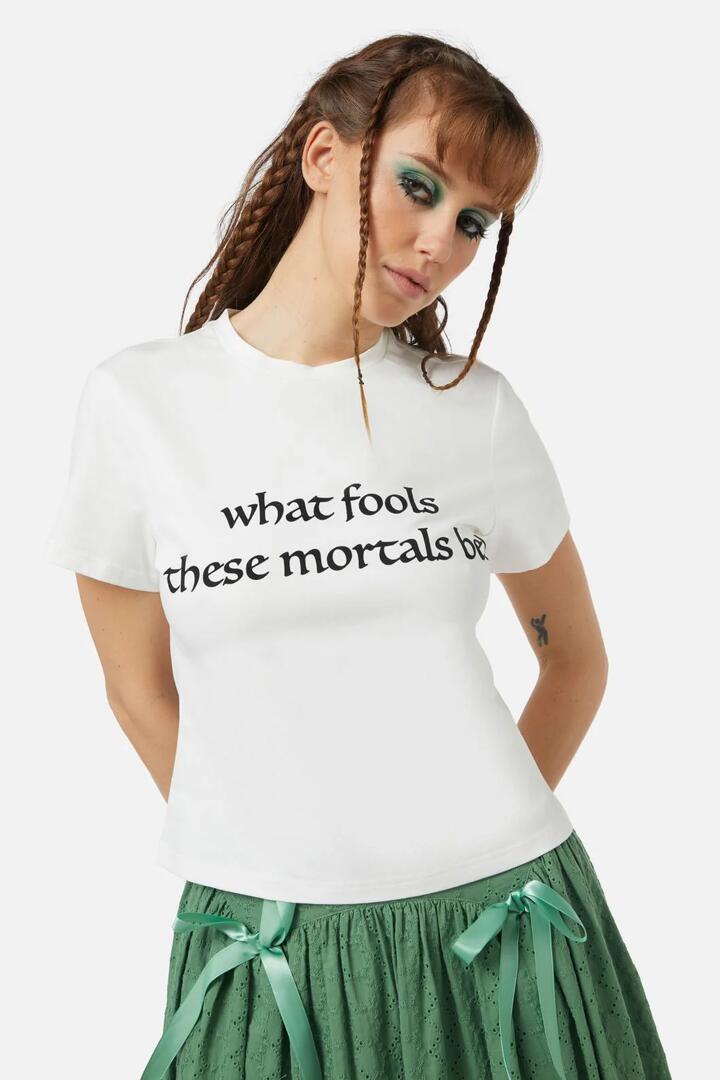 Image of a model wearing Tops. Productname: Mortals Tee in Cream colour by brand - Black Friday