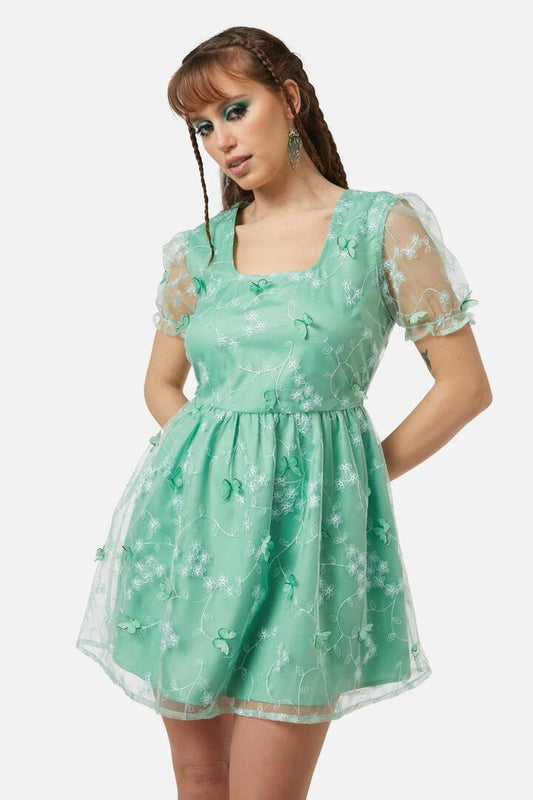 Image of a model wearing Dress. Productname: Changeling Dress in Green colour by brand - Black Friday