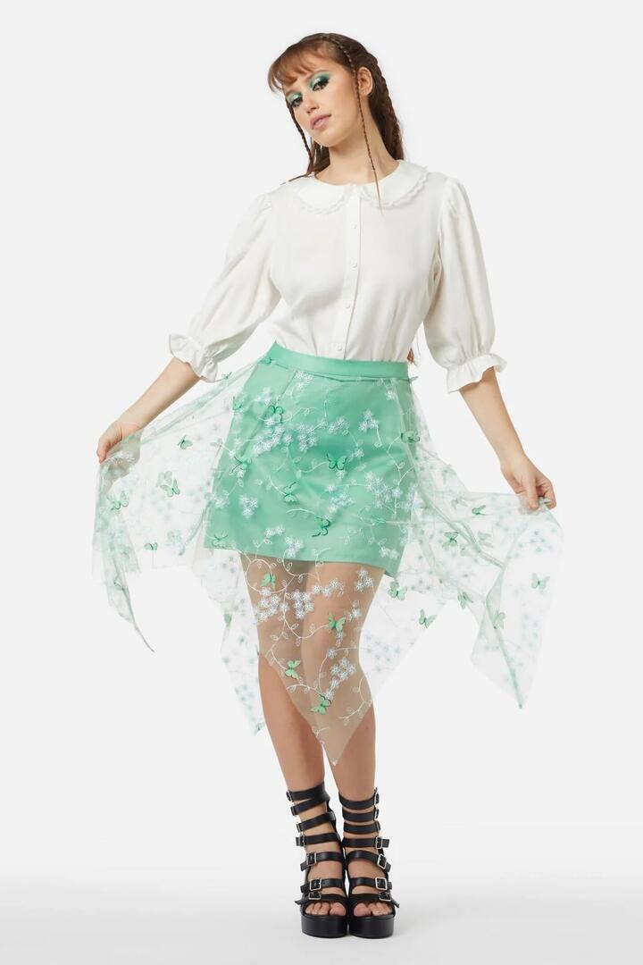 Image of a model wearing Skirts. Productname: Changeling Skirt in Green colour by brand - Black Friday