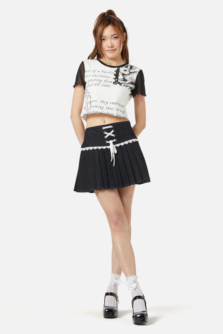 Image of a model wearing Denim. Productname: Pleated Denim Skirt in Black colour by brand - Dangerfield
