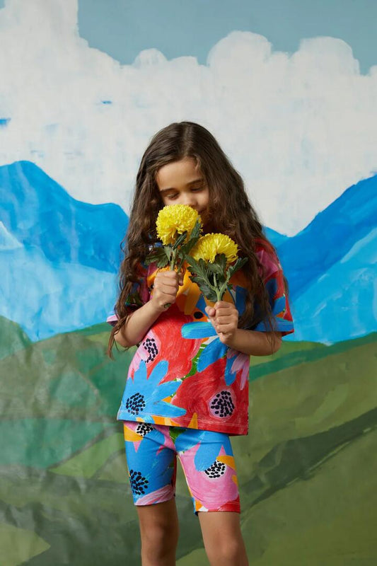 Image of a model wearing Tops. Productname: Big Floral Kids SS Tee in Print colour by brand - Princess Highway Kids