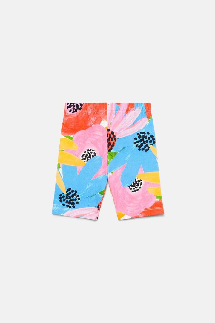 Image of a model wearing Shorts. Productname: Big Floral Kids Bike Short in Print colour by brand - Princess Highway Kids