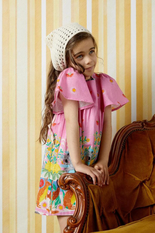Image of a model wearing Dress. Productname: Koala Kids Border Dress in Pink colour by brand - Princess Highway Kids