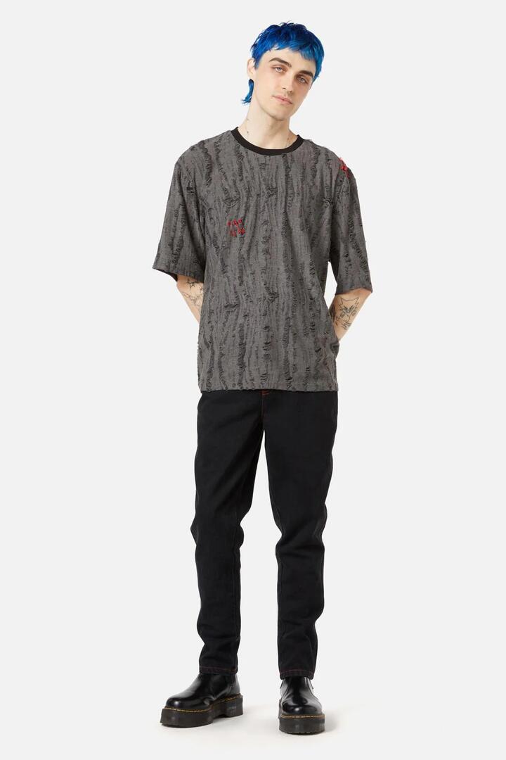 Image of a model wearing Tops. Productname: Lock Picker SS Distressed Tee in Grey colour by brand - Black Friday