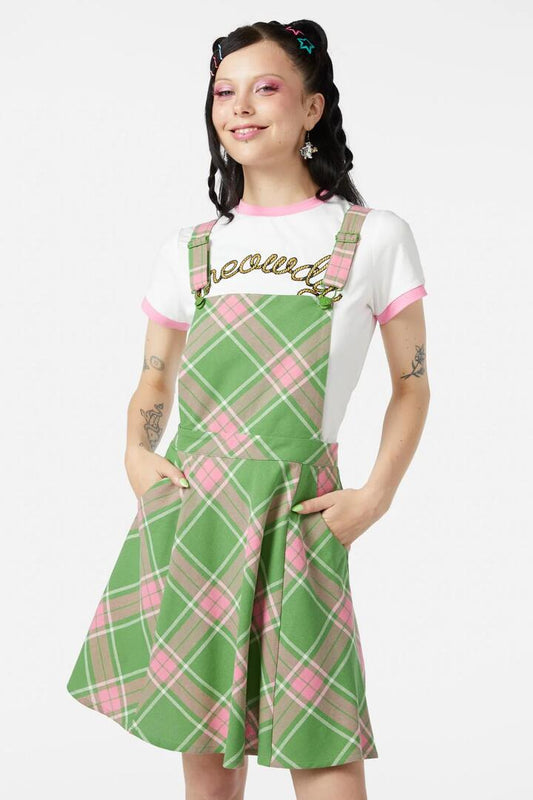 Image of a model wearing Dress. Productname: Ranch Tartan Pinny in Green/Pink colour by brand - Dangerfield