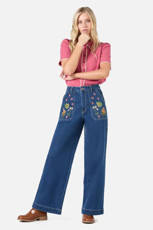 Image of a model wearing Denim. Productname: Native Embroidered Denim Jean in Blue Denim colour by brand - Princess Highway