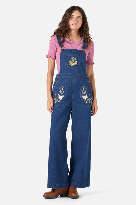 Image of a model wearing Pants. Productname: Chickens Embroidered Overall in Blue Denim colour by brand - Princess Highway