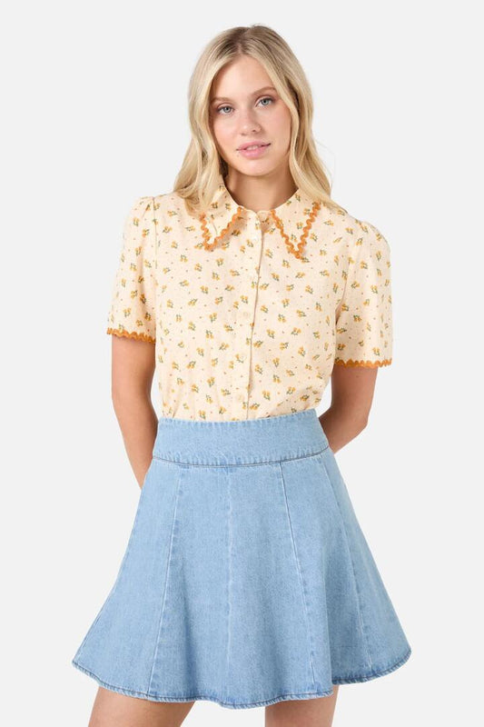 Image of a model wearing Shorts. Productname: Holly Short Sleeve Blouse in Pink colour by brand - Princess Highway