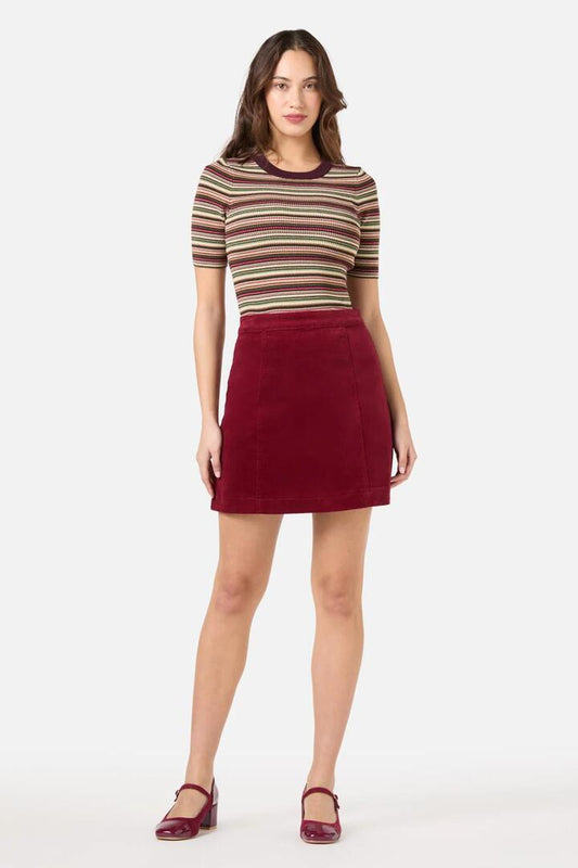 Image of a model wearing Skirts. Productname: Charlie Girl Skirt in Red colour by brand - Princess Highway