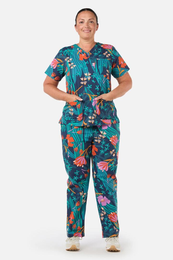 Image of a model wearing Uniforms & Workwear. Productname: Alice Scrub Set in Navy colour by brand - Princess Highway