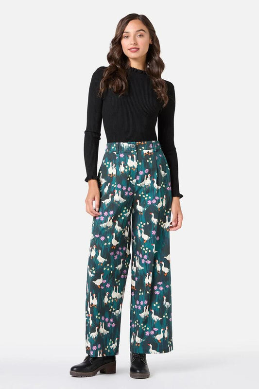 Image of a model wearing Pants. Productname: Lucy Goosey Cute Pant in Midnight colour by brand - Princess Highway