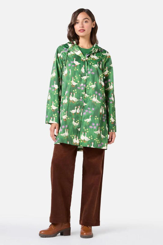 Image of a model wearing Rain Coats. Productname: Lucy Goosey Raincoat in Green colour by brand - Princess Highway