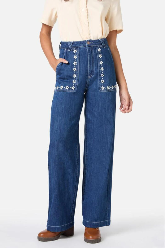 Image of a model wearing Denim. Productname: Meg Daisy Embroidered Jean in Blue Denim colour by brand - Princess Highway