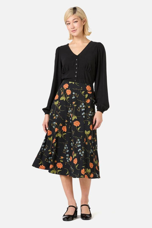 Image of a model wearing Skirts. Productname: Esmerelda Floral Midi Skirt in Black colour by brand - Princess Highway