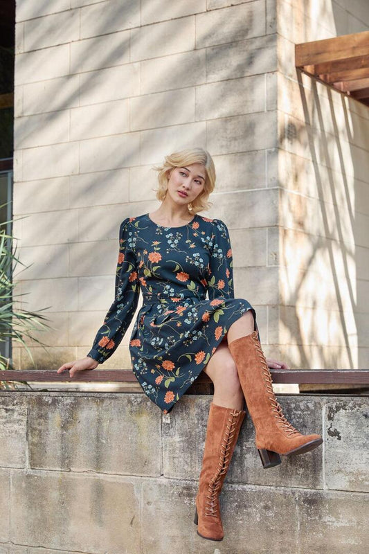 Image of a model wearing Dress. Productname: Esmerelda Floral Mini Dress in Black colour by brand - Princess Highway