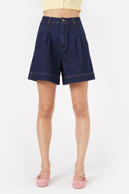 Image of a model wearing Skirts. Productname: Callista Skort in Dark Denim colour by brand - Princess Highway