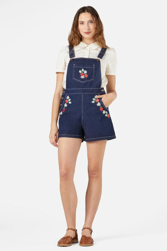 Image of a model wearing Pants. Productname: Sweet Jam Short Overall in Blue Denim colour by brand - Princess Highway