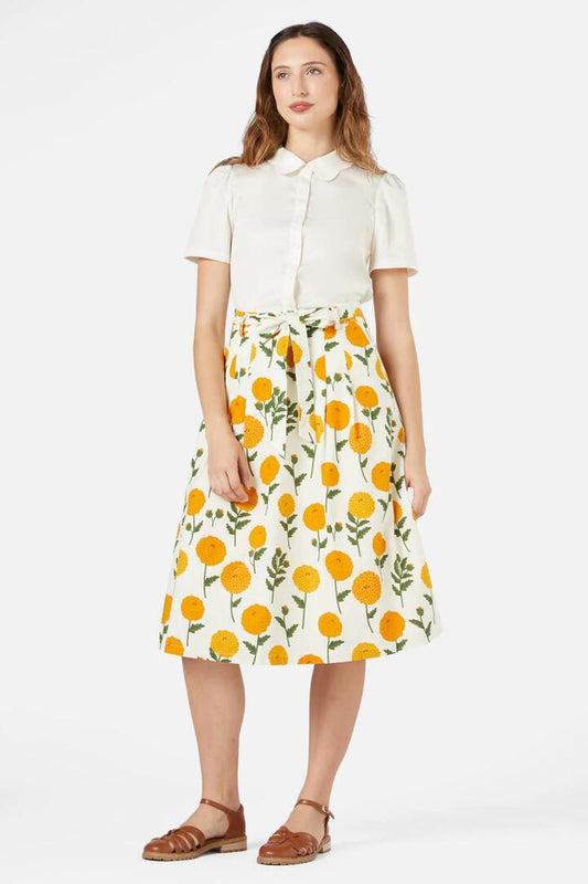 Image of a model wearing Skirts. Productname: Marie Fleur Midi Skirt in Cream colour by brand - Princess Highway