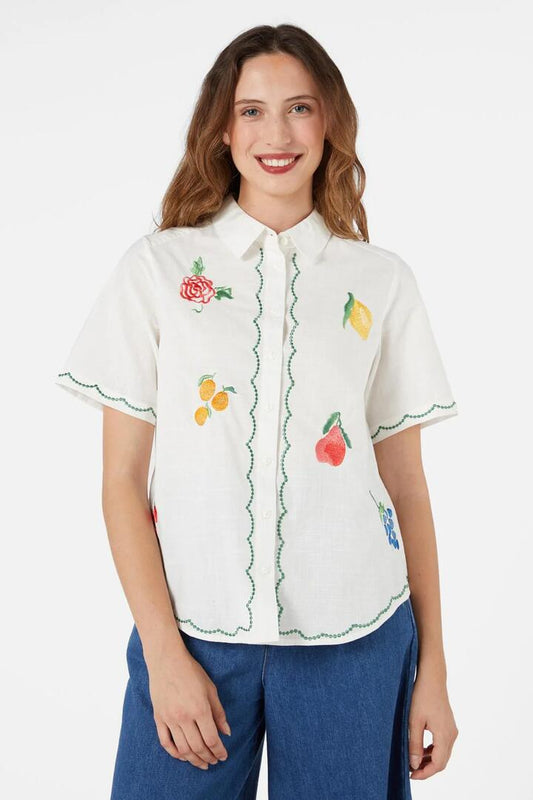 Image of a model wearing Tops. Productname: Orchard Emb Shirt in Cream colour by brand - Princess Highway