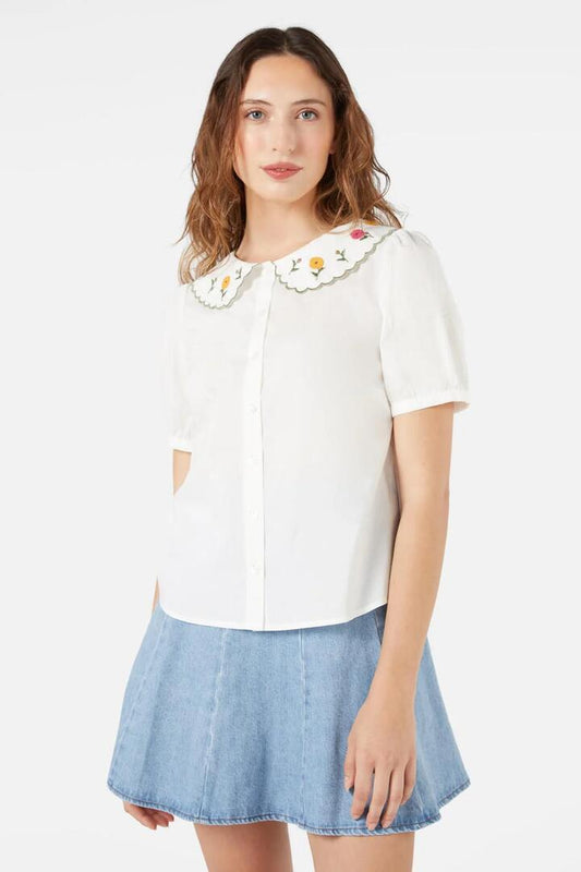 Image of a model wearing Tops. Productname: Marie Fleur Emb Blouse in Cream colour by brand - Princess Highway