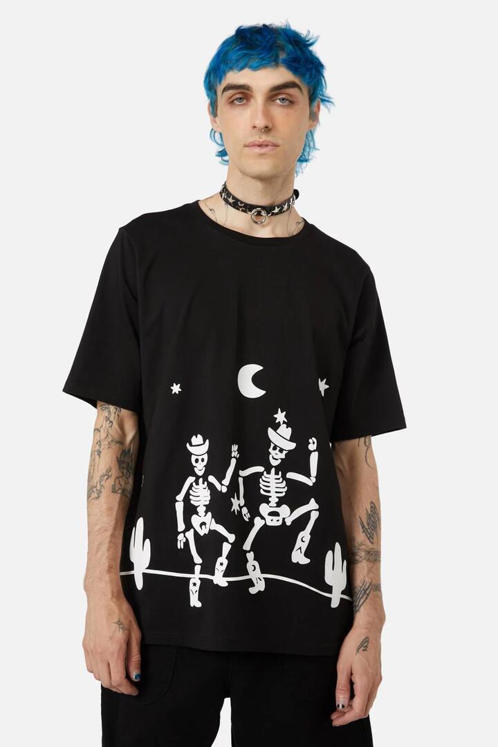 Image of a model wearing Tops. Productname: Kick The Dust Up Tee in Black colour by brand - Black Friday
