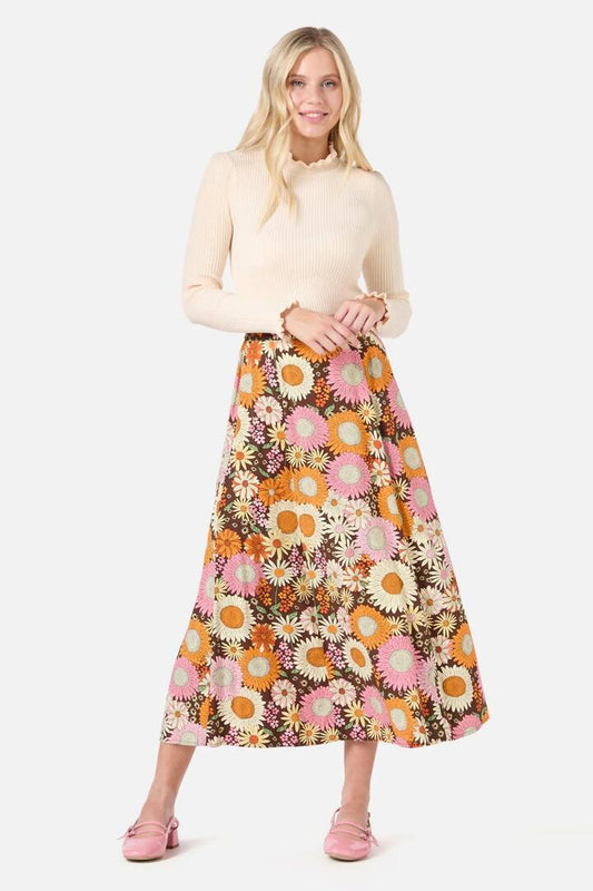 Image of a model wearing Skirts. Productname: Viva Floral Midi Skirt in Chocolate colour by brand - Princess Highway