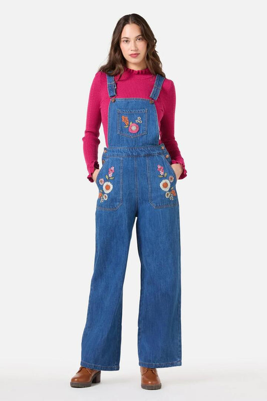 Image of a model wearing Pants. Productname: Viva Floral Embrodiered Overall in Blue Denim colour by brand - Princess Highway
