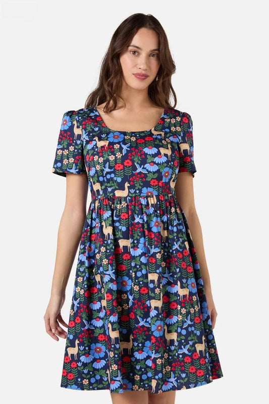 Image of a model wearing Dress. Productname: Llama Short Sleeve Dress in Navy colour by brand - Princess Highway