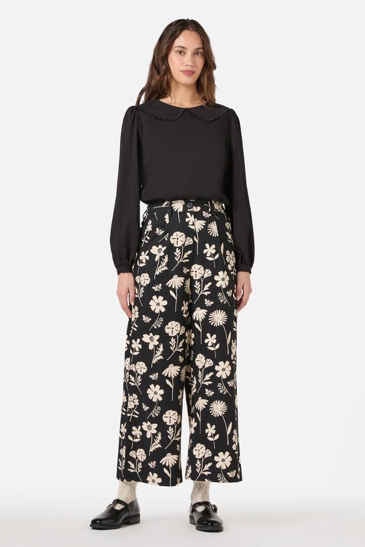 Image of a model wearing Pants. Productname: Variety Fleur Culotte in Black colour by brand - Princess Highway
