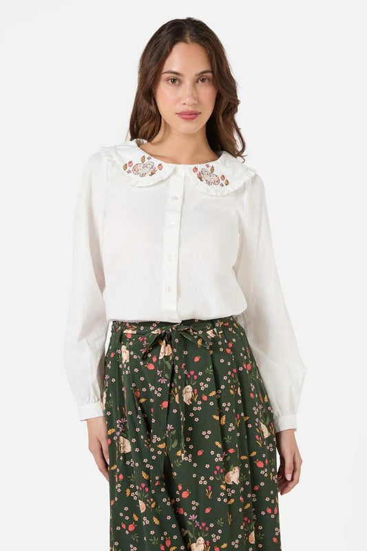Image of a model wearing Tops. Productname: Rabbit Embroidered Blouse in Cream colour by brand - Princess Highway
