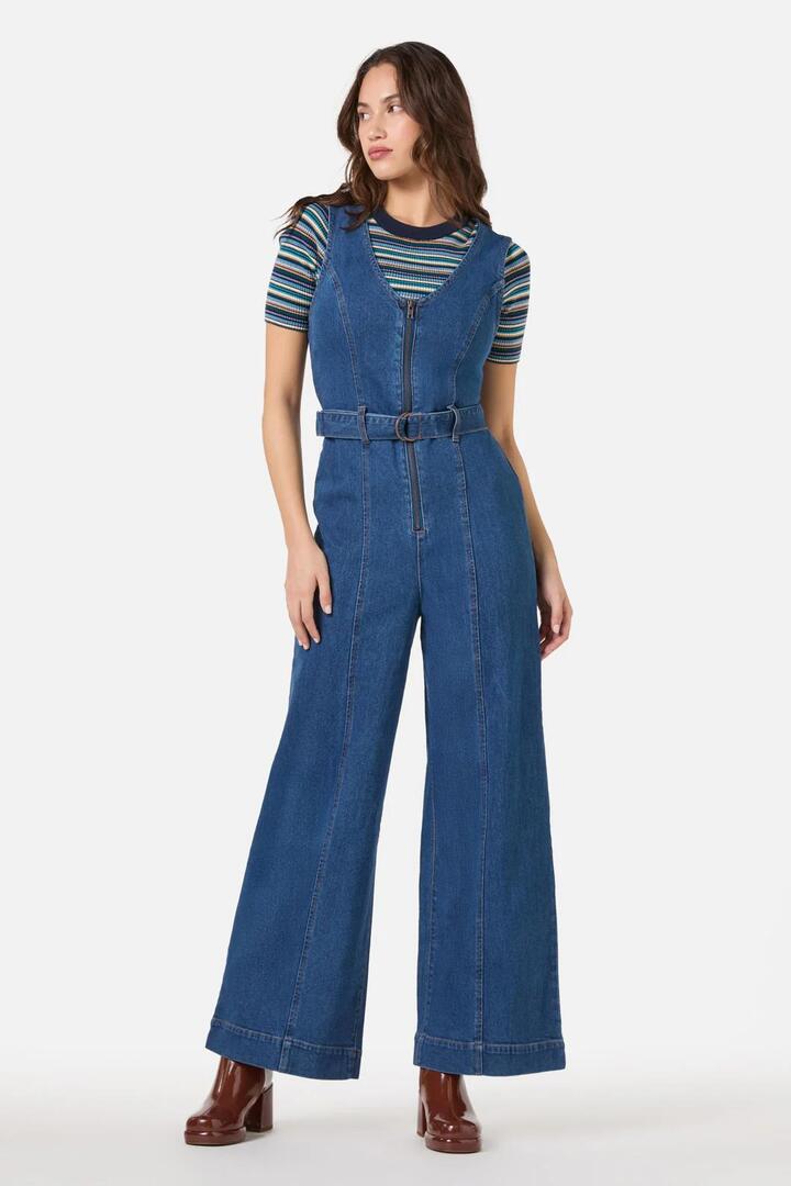 Image of a model wearing Denim. Productname: Codi Denim Sleeveless Jumpsuit in Denim colour by brand - Princess Highway