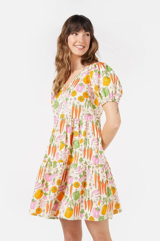 Image of a model wearing Dress. Productname: Veggie Patch Mini Dress in Cream colour by brand - Princess Highway